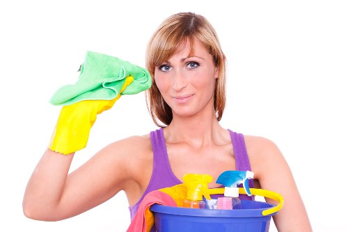Domestic cleaner working in a Bayswater apartment living room