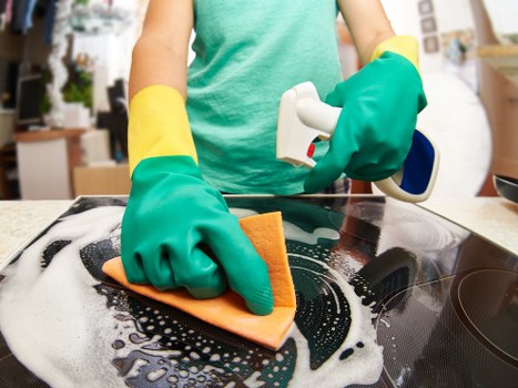 Local carpet cleaner treating stained carpet in a Bayswater apartment or townhouse